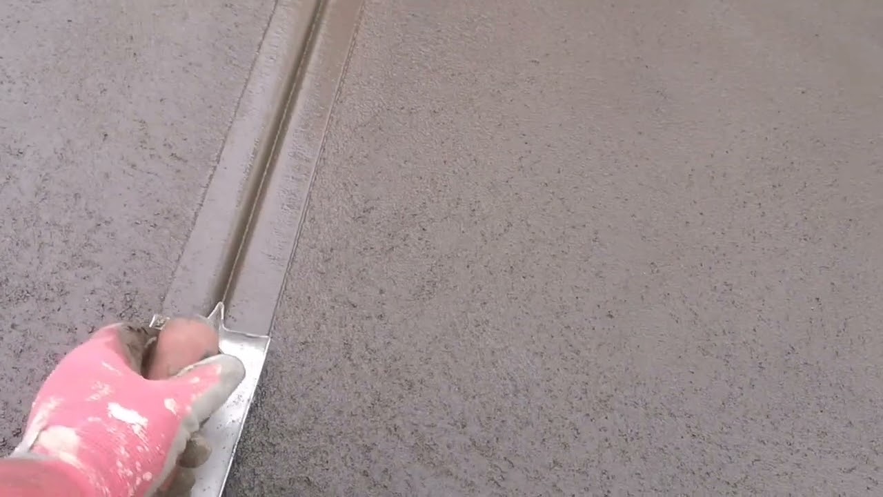 Trottoir beton finition quartz